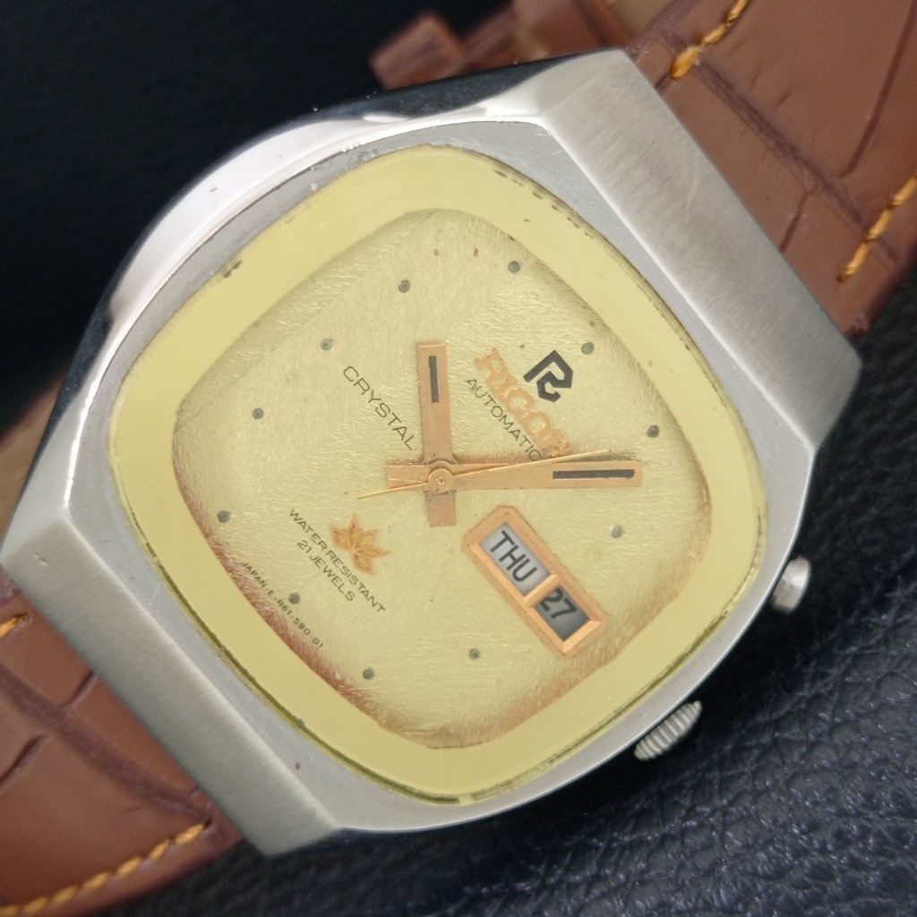Vintage 1974 Ricoh Automatic Mens Silver Watch WDaydate  Champagne Accents